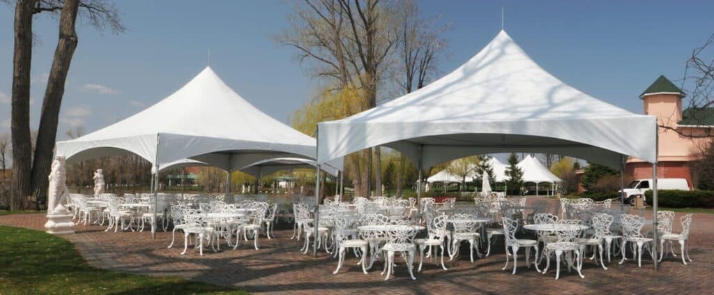 Event with white tens and chair rentals