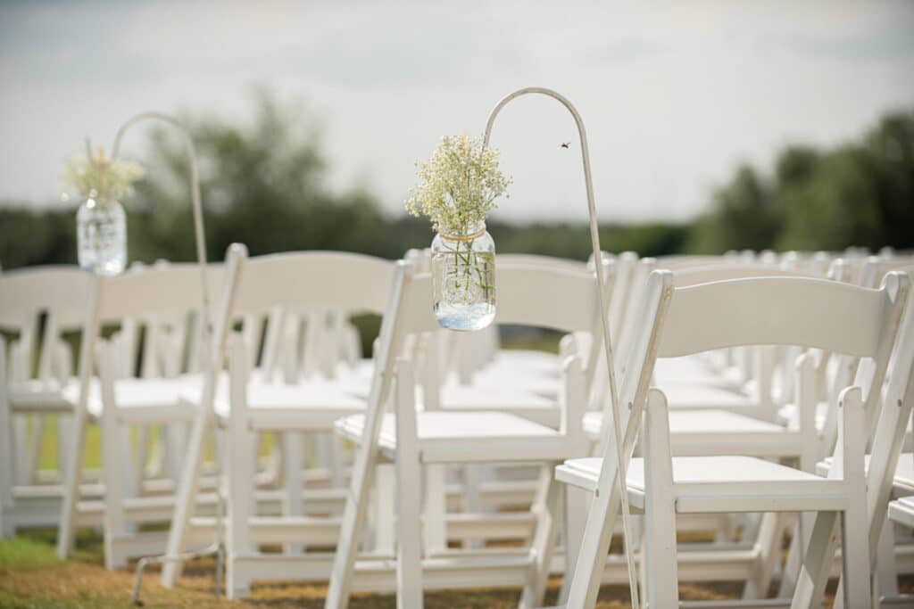 White folding chairs for wedding or event
