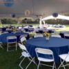 table chairs and tent rental party with blue table cloths