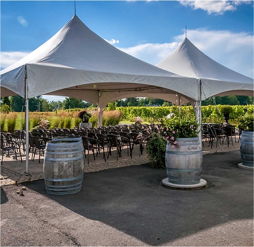 large white tent setup for an outdoor event