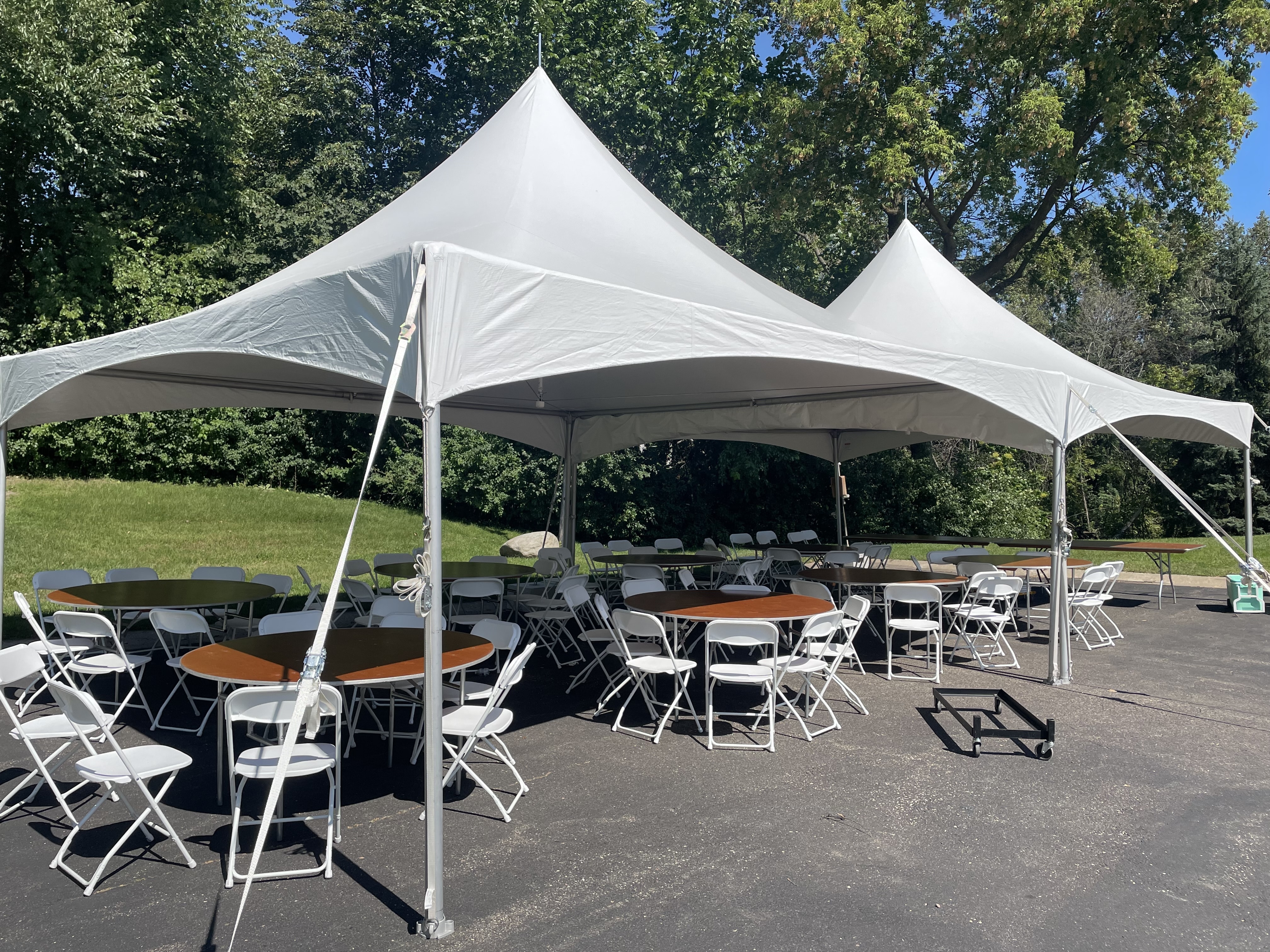 Tents with round tables and chairs