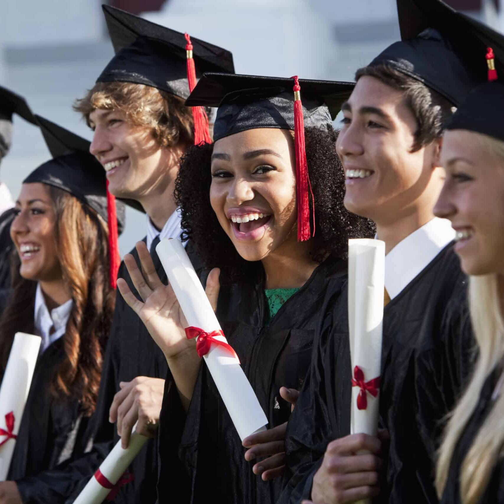 Graduates Smiling happy classmates