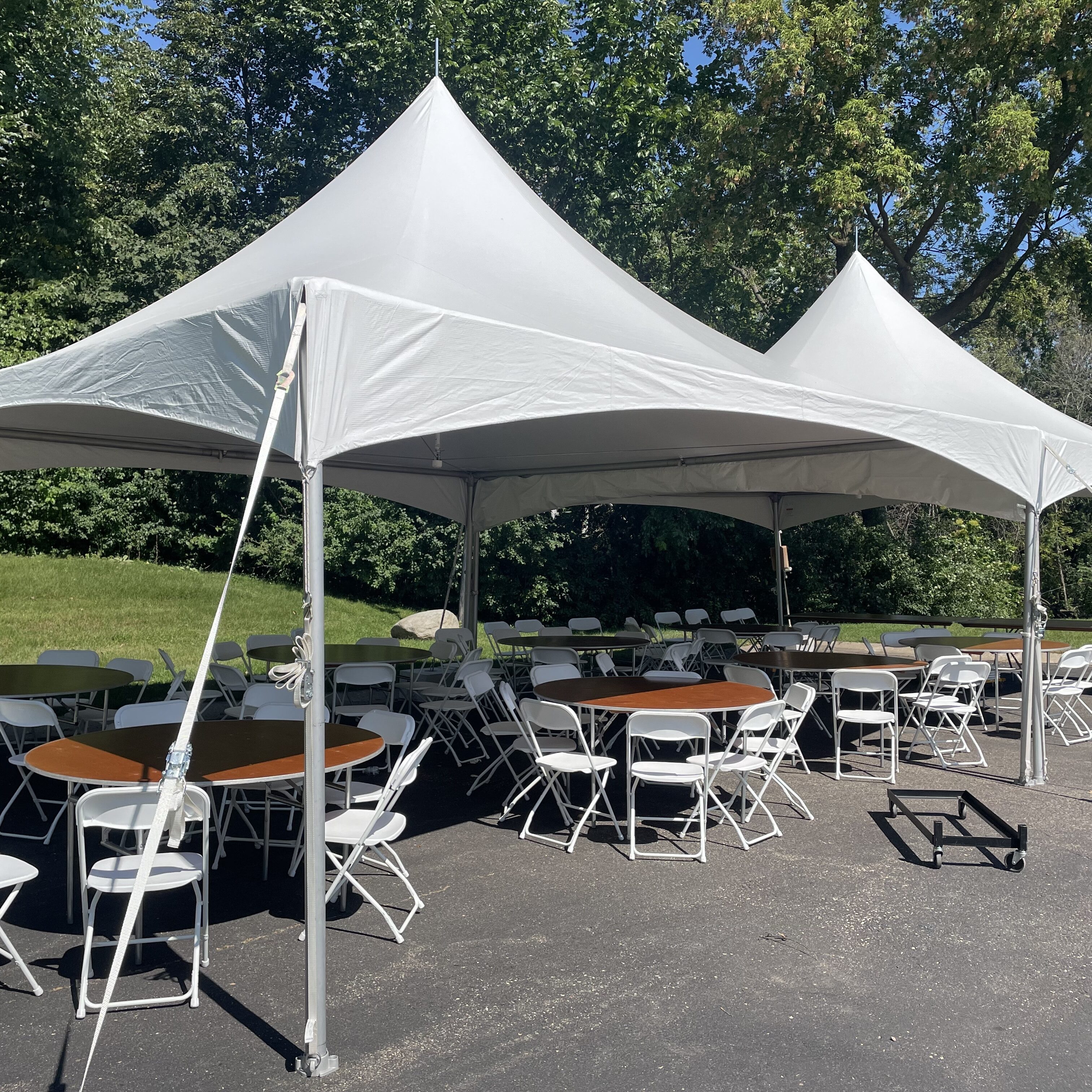 Tents with round tables and chairs