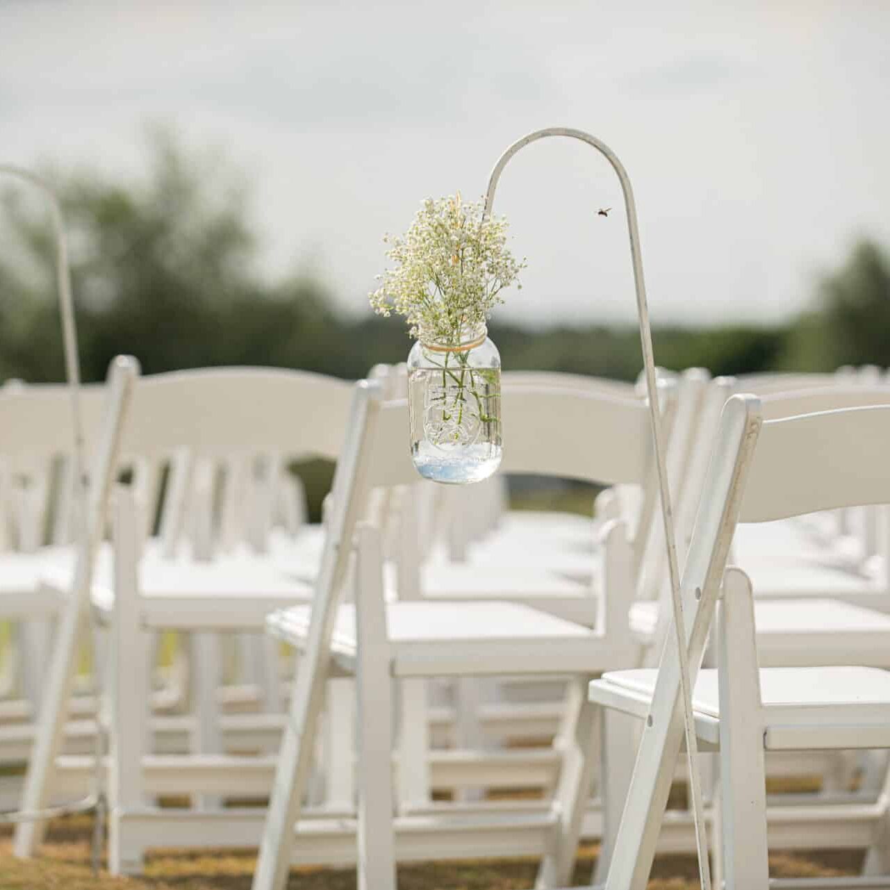 White folding chairs for wedding or event